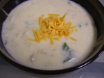 a steaming warm bowl of potato soup